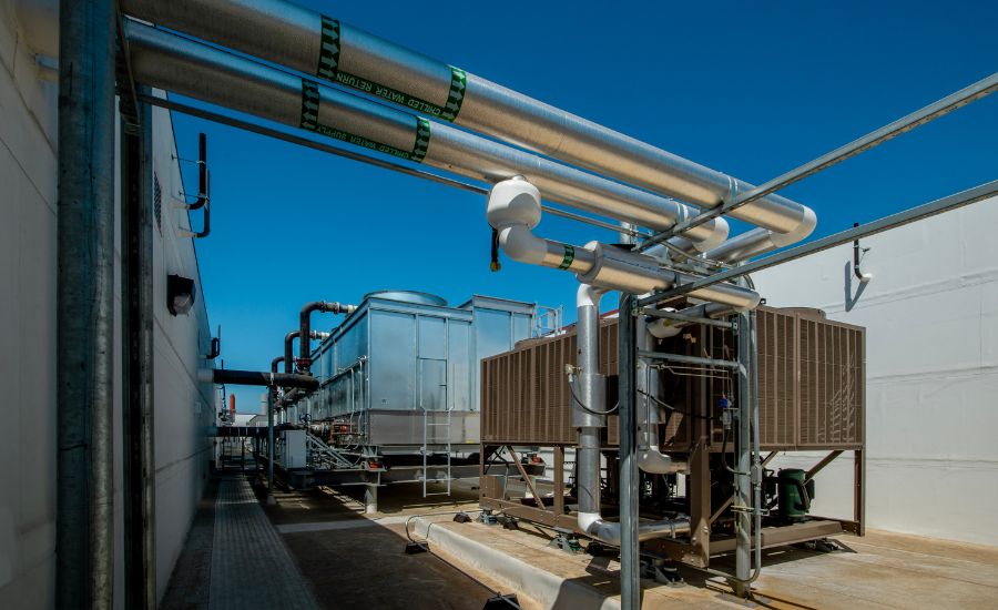 Commercial air conditioning units installed on the rooftop of a large building
